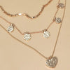 Multi Layer Hammered Disc Heart Necklace